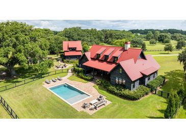 Luxury home with pool and guest house at 6024 Selkirk Plantation Rd, Wadmalaw Island, SC 29487