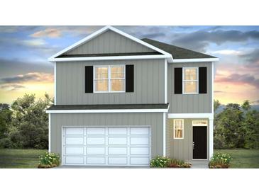 Two-story home with gray siding and a two-car garage at 2204 Macallan Blvd, Ravenel, SC 29470