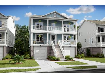 Two-story light blue house with a front porch and attached garage at 1639 Siloh Siloh Dr # 484, Mount Pleasant, SC 29466