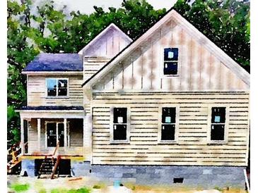 New construction home with beige siding and a large backyard at 4504 Smoak Rd, Meggett, SC 29449
