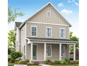 Two-story farmhouse-style home with light beige siding and a front porch at 410 Swaying Pine Ln, Summerville, SC 29486