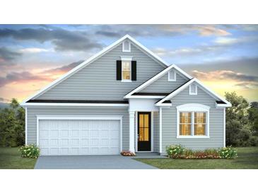 One-story home with gray siding, white trim, and double garage at 152 Carolina Groves Blvd, Moncks Corner, SC 29461