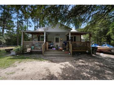 Front view of a single story home with a porch at 316 Haynes St, Walterboro, SC 29488