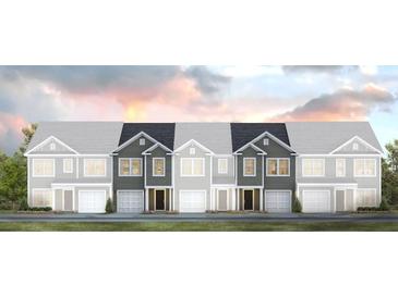 Four attached townhouses with gray and white exterior at 213 Blue Haw Dr, Moncks Corner, SC 29461