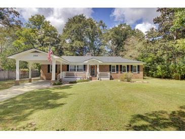 Brick ranch home with carport and spacious yard at 1510 Jahnz Ave, Summerville, SC 29485