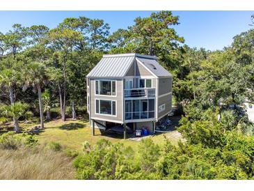Unique two-story home with metal roof and deck at 2473 High Hammock Rd, Seabrook Island, SC 29455