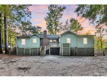 Charming raised cottage with deck, and spacious backyard at 410 Four Holes Road, Dorchester, SC 29437