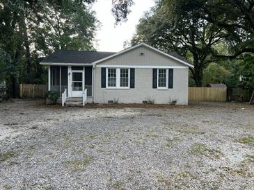 Newly renovated Ranch home with gravel driveway at 7629 Pinehurst St, North Charleston, SC 29420
