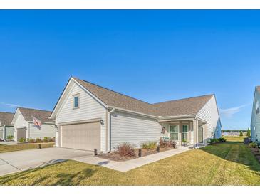 Charming one-story home with attached garage and landscaped yard at 176 Garden Gate Way, Summerville, SC 29486