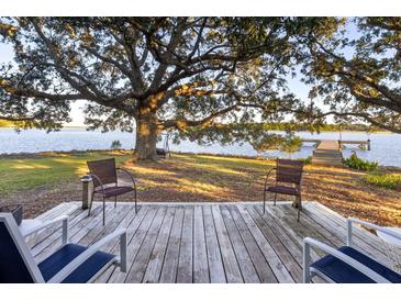 Wooden deck overlooking calm water at 3531 Old Ferry Rd, Johns Island, SC 29455