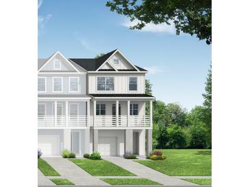 Three-story home with white siding, black roof, and front porch at 418 Katies Scenic Ct, Charleston, SC 29492