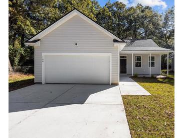 New construction home with gray siding, white trim, and a two-car garage at 168 Aleene Dr, Summerville, SC 29485