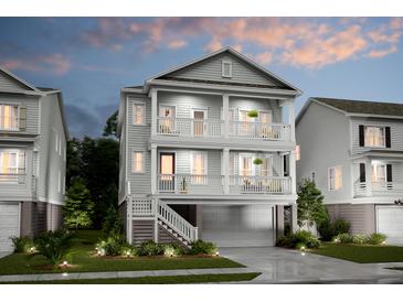 Two-story home with charming exterior and attached garage at 1718 Cultivation Lane St # 536, Mount Pleasant, SC 29466