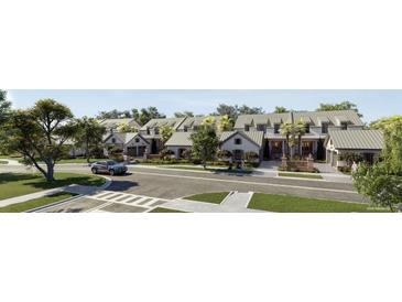 Aerial view of townhouses with lush landscaping at 527 Helmsman St # 527, Daniel Island, SC 29492