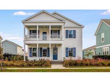 Two story home with blue shutters and front porch at 218 Symphony Ave, Summerville, SC 29486
