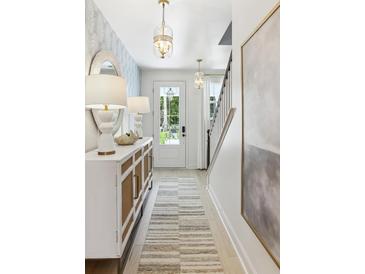 Bright and airy entryway with stylish console table at 297 Claret Cup Way, Charleston, SC 29414