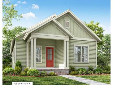 Charming one-story craftsman home with red door and landscaping at 506 Rustling Tree Ct, Summerville, SC 29486