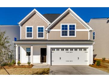 Two-story house with neutral siding, white trim, and a two-car garage at 122 O'Leary Cir, Summerville, SC 29483