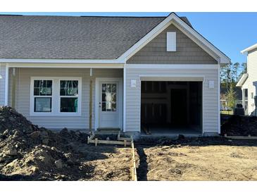 New construction home with attached garage and landscaping at 854 Descartes St, Summerville, SC 29486