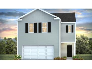 Two-story home with gray siding, black shutters, and a two-car garage at 6261 Gritman Dr, Hollywood, SC 29470