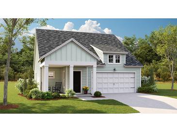 Charming one-story home with a front porch and two-car garage at 1018 Currant Rd, Summerville, SC 29485
