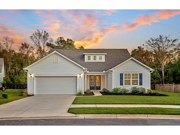 Charming one-story house with a gray roof, white siding, and a two-car garage at 522 Oak View Way, Summerville, SC 29483