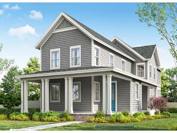 Two-story gray house with white columns and a teal door at 718 Rumbling Leaf Ln, Summerville, SC 29486