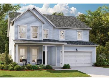 Two-story light blue house with gray roof, front porch, and two-car garage at 184 Belfort Pl, Summerville, SC 29486