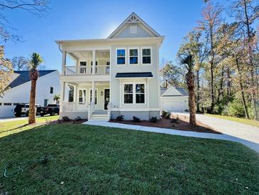 Two-story house with front porch and landscaped lawn at 4217 Royal Harbor Rd, Hollywood, SC 29449