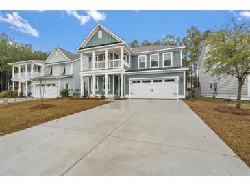 Two-story craftsman home with gray siding, white trim, and a two-car garage at 758 Maynard Ln, Summerville, SC 29486