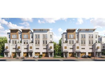 Two-story townhouses with attached garages and modern design at 1150 Valdosta St # 302, North Charleston, SC 29405