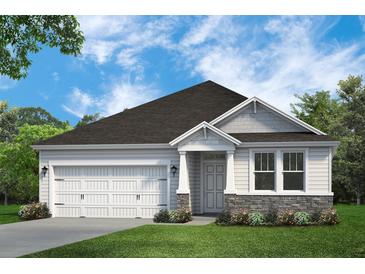 Craftsman style home with white siding, stone accents, and a two-car garage at 244 Mcmakin Dr, Summerville, SC 29483