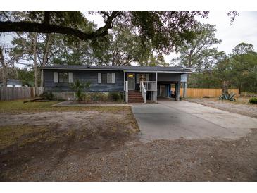 Ranch style home with carport and fenced yard at 1905 Central Park Rd # B, Charleston, SC 29412