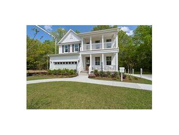 Two-story house with front porch and landscaped yard at 768 Maynard Ln, Summerville, SC 29486