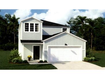 Two-story house with light gray siding, white trim, and a two-car garage at 302 Tiliwa St, Summerville, SC 29486