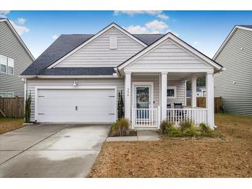 Charming one-story house with a front porch and attached garage at 356 Garden Lily Ln, Summerville, SC 29485