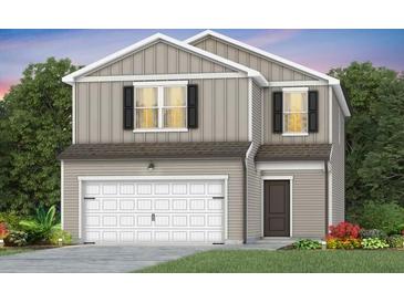 Two-story house with gray siding, white garage door, and landscaping at 764 Meadowbrook Ln, Summerville, SC 29486