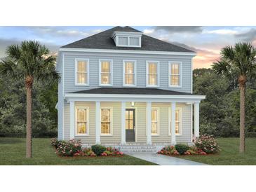 Two-story house with gray siding, white trim, and a front porch at 825 Gentle Breeze Dr, Summerville, SC 29486