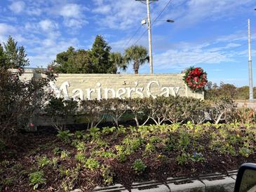 Attractive entrance to Mariner's Cay community with landscaping at 2 Mcdonough Rd # B-19, Folly Beach, SC 29439