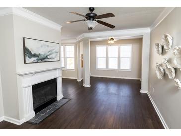 Spacious living room with fireplace and hardwood floors at 2233 Chatelain Way, Mount Pleasant, SC 29464