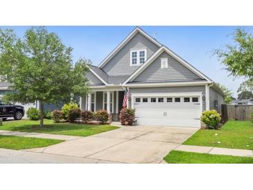 Gray two-story house with a two-car garage and manicured lawn at 3286 Hartwell St, Johns Island, SC 29455