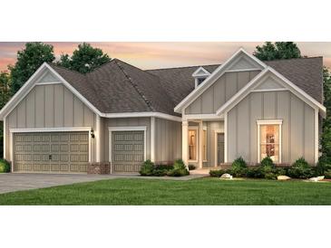Two-story house with gray siding, two-car garage, and manicured lawn at 4271 Hugh Bennett Dr, Johns Island, SC 29455