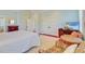 Main bedroom with sitting area and a large TV at 913 Carolina Blvd, Isle of Palms, SC 29451