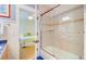 Bathroom with shower/tub combo, granite vanity, and view of bedroom at 913 Carolina Blvd, Isle of Palms, SC 29451
