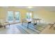 Basement recreation area with ping pong table and access to backyard at 913 Carolina Blvd, Isle of Palms, SC 29451