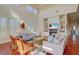 Spacious living room with hardwood floors, high ceilings, and fireplace at 913 Carolina Blvd, Isle of Palms, SC 29451
