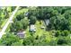 Aerial view of home surrounded by trees and green space at 1633 Rose Dr, Summerville, SC 29486
