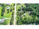 Aerial view of property showing home, trees, and surrounding area at 1633 Rose Dr, Summerville, SC 29486