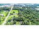 Aerial view showcasing a home in a wooded setting at 1633 Rose Dr, Summerville, SC 29486
