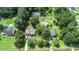 Aerial view of a neighborhood with houses and green space at 1633 Rose Dr, Summerville, SC 29486